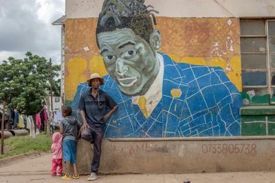 ‘These are our local heroes’: the artist painting murals of hope in a Zimbabwe township