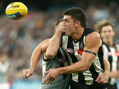 Collingwood pair hit with AFL suspensions