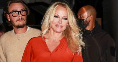 Newly single Pamela Anderson is a sunset dream in orange for dinner date with son
