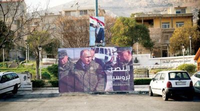 Damascus Raises Putin Road Signs Despite Economic Turmoil