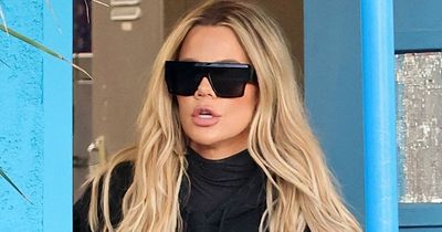 Khloe Kardashian 'shades' sister Kim as she heads out in Kanye West hoodie