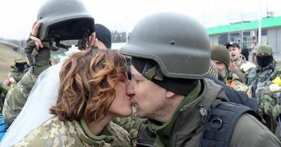 Ukrainian soldier couple tie the knot on front line in emotional impromptu ceremony