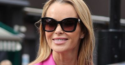 Amanda Holden wraps up in pink suit as she ditches raunchy work outfits