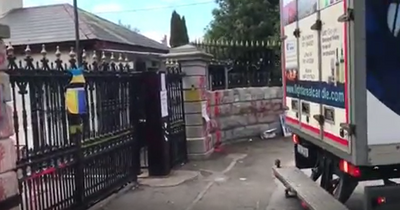 Footage shows truck crashing through gates of Russian Embassy in Dublin as man arrested