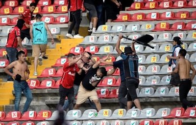 Mexico bans away fans after football violence suspended match