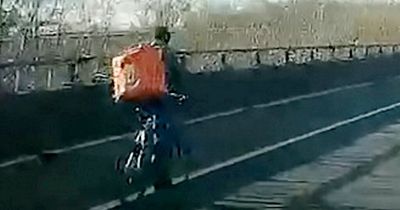 Just Eat delivery rider filmed cycling along motorway near infamous junction