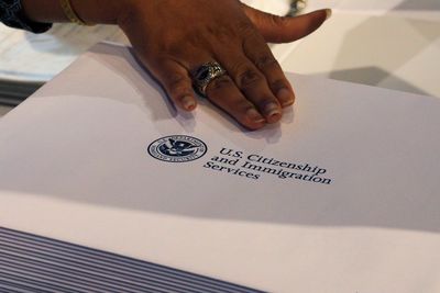 U.S. adopts rules easing path to green cards for abused, neglected minors