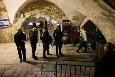 Palestinian stabs officers in Jerusalem, is shot dead: police