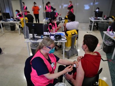 NSW reports 5 virus deaths, 13,018 cases