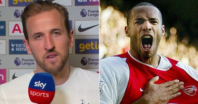 Harry Kane reacts to overtaking Thierry Henry's Premier League goalscoring record