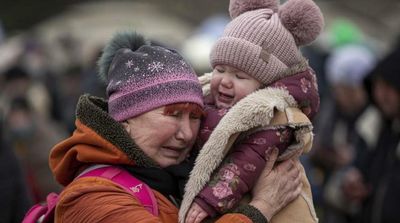 Ukrainians Escape Besieged Sumy in First Evacuation Corridor Agreed with Russia
