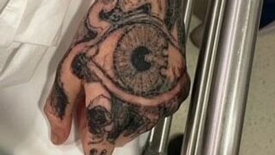 NSW Police hopes photo of tattoo will help identify Sydney Harbour Bridge crash driver