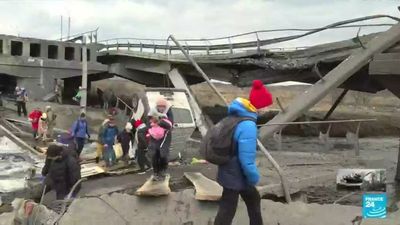 War in Ukraine: Civilians flee strategic town of Irpin as Russian troops advance