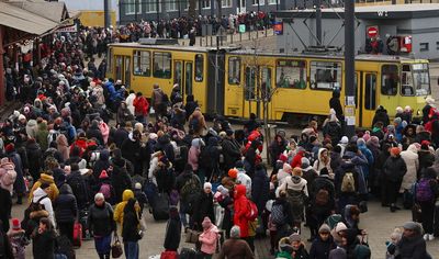 Ukrainians stream over the borders as evacuations from besieged cities begin