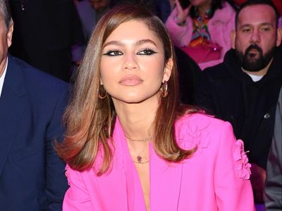 ‘A dream’: Zendaya rocks hot-pink Valentino suit at Paris Fashion Week