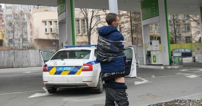 Looter tied up and humiliated for trying to steal during Russian attack on Kyiv