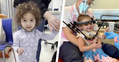 The beautiful moment a toddler takes first steps after horror crash shattered her spine