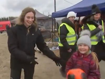 Ukrainian child interrupts NBC News broadcast from refugee camp