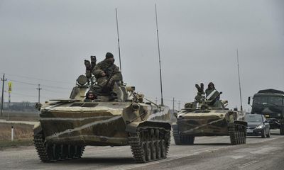 Russian soldiers accused of firing on civilian vehicles in Ukraine