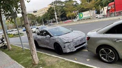 Toyota BZ Sdn Electric Sedan Spotted Hiding Production Body