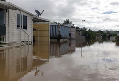 ‘I can’t afford to go anywhere else’: the NSW caravan park residents devastated by floods