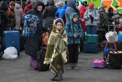 Ukraine refugees seeking UK visas ‘forced to queue for hours in freezing cold’ in Poland