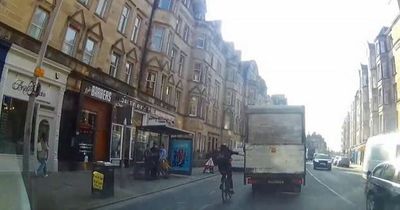 Edinburgh 'thrill-seeker' cyclist filmed catching a lift from lorry through the streets of the city centre