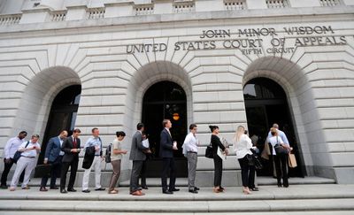 Vaccine mandate for federal employees awaits court ruling