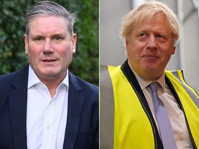 Tory peer calls for Labour leader to be included in wartime coalition government