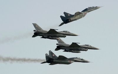 Poland offers fighter jets to US in plan to help Ukraine