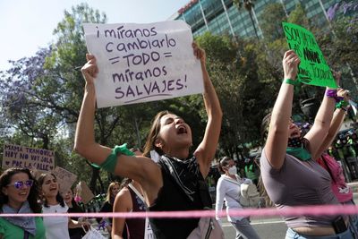 Mexican women protest femicides as president warns against violence