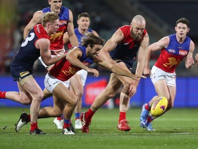 AFL captains split on grand final tips