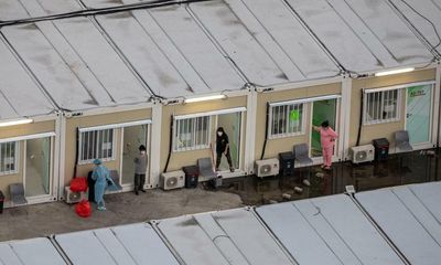 China builds new bridge to Hong Kong to rush in workers as Covid cases surge
