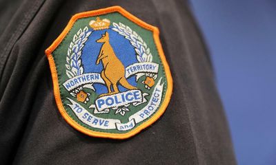 NT police say officer fired gun six times at Indigenous man allegedly armed with a spear