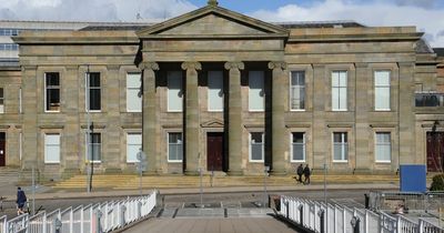 Lanarkshire man cleared of slashing partner