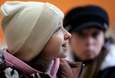 1 million children leave behind lives, friends in Ukraine