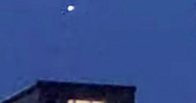 Edinburgh UFO caught on camera hovering above homes and shooting across sky