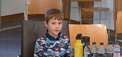 Callum, age 7, brings his reusable water bottle campaign to Holyrood