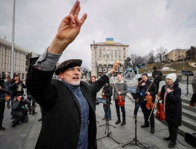 Orchestra plays national anthem in central Kyiv as Russians advance