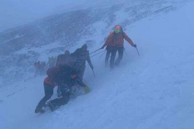 Ben Nevis climber, 28, dies and 17 people rescued after being stranded on the mountain