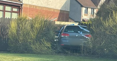 Woman charged after car crashes into garden fence in Aberdeen