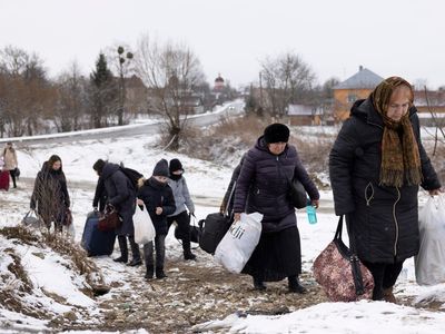 Ukraine war in pictures: Refugees, protests and resistance as Russian war enters third week