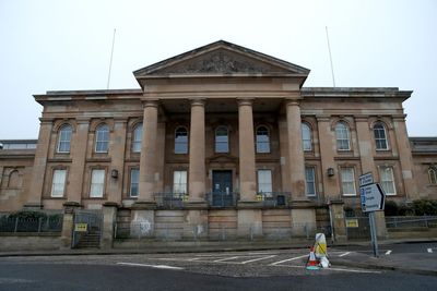 Dundee woman appears in court charged with murder of man, 33