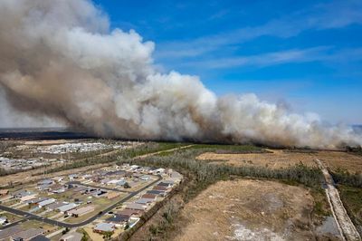 Florida wildfire: Hope for relief from light, steady rain