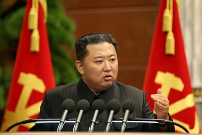 North Korea's Kim praises scientists after 'satellite' test