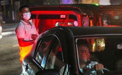 AP PHOTOS: Sri Lankan power cuts affect all walks of life