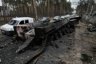 Russian convoy near Kyiv ‘suffering continued losses’ and Putin forced to use conscript troops, UK claims