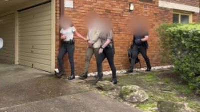 Sydney teacher charged after police allegedly find child abuse material on two phones and laptop