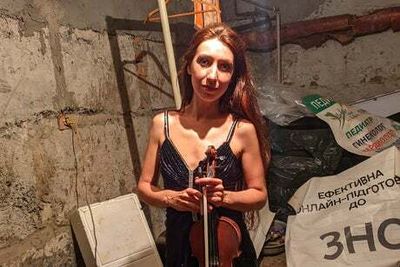 Cellar violinist becomes internet sensation after playing as bombs rained down on Kharkiv