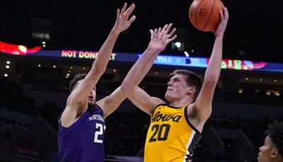 No. 24 Iowa sets Big Ten records in rout of Northwestern